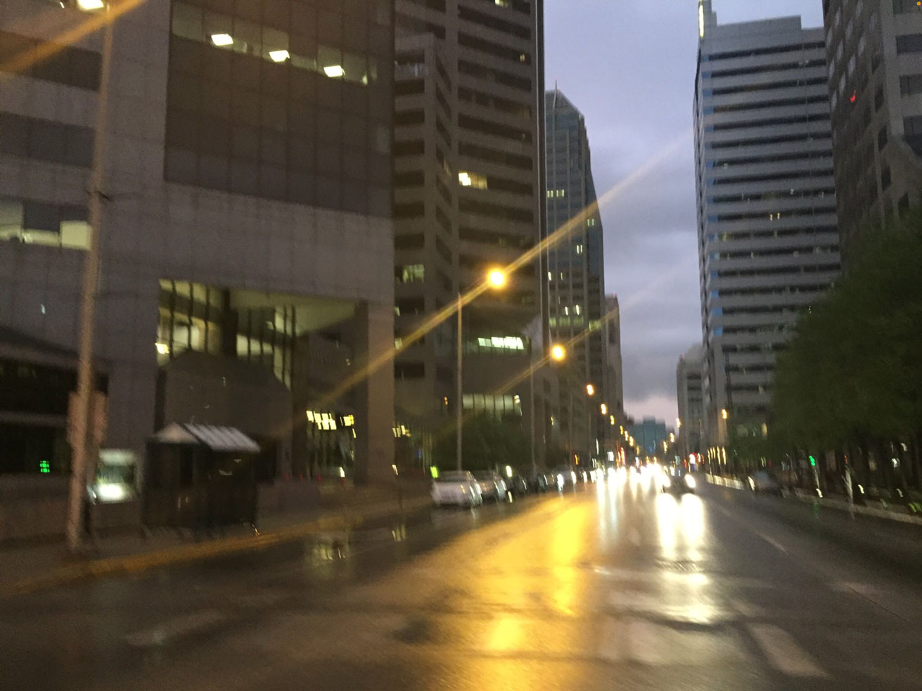 A picture of the streets of downtown Indianapolis at night.