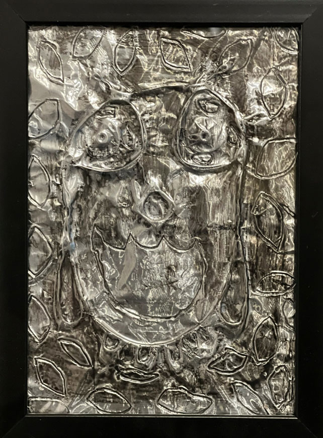 A foil artwork of an owl.