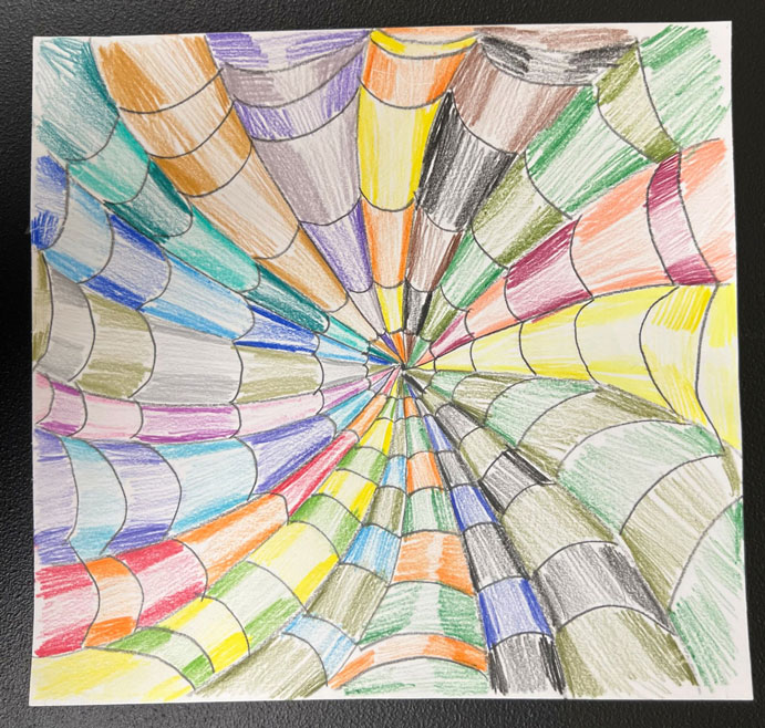 Child's multiple color spiral illusion artwork.